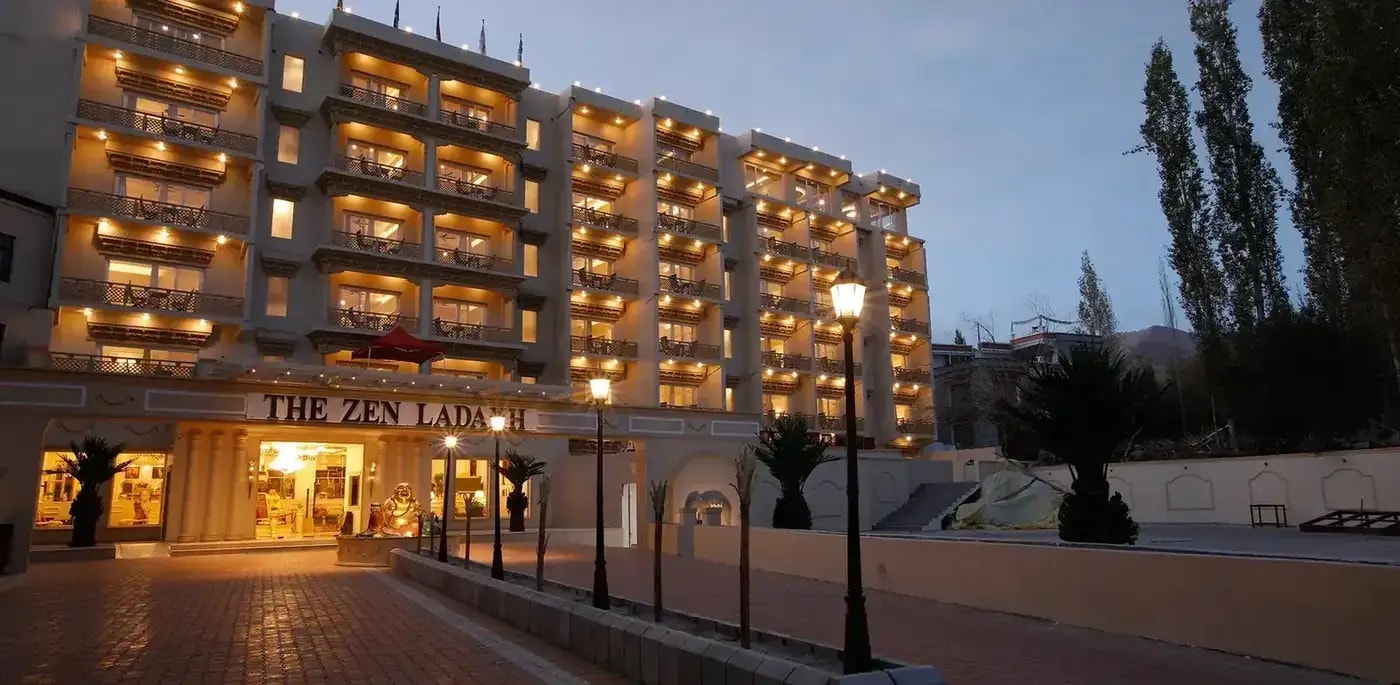 The Zen Ladakh hotel lit at dusk in Leh