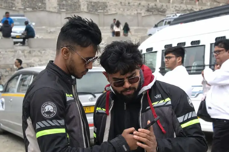 Manali to Ladakh Royal Enfield bike tour — riders crossing Baralacha La, Khardung La and Pangong with Trip India Hotels & Holidays